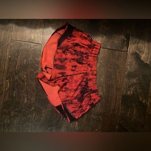 lululemon hotty hot shorts: red and black tie dye size 10 length 2.5’